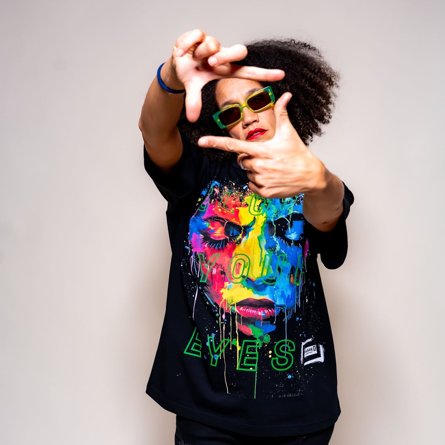 Close Your Eyes surreal pop art portrait graphic tee shirt on model | F.A.M.E. X streetwear