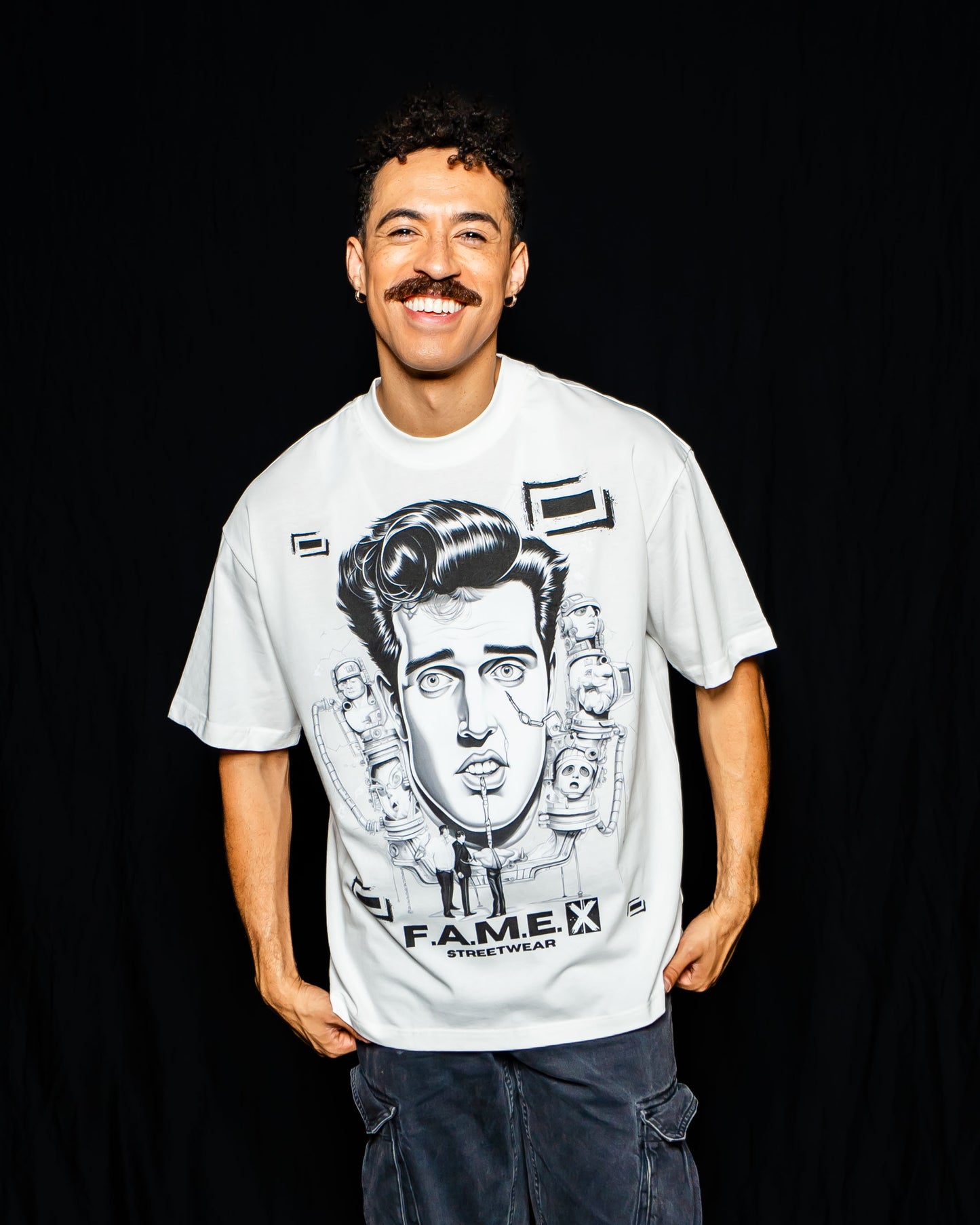 Man-Made King Elvis inspired king of rock pop art graphic tee shirt on model | F.A.M.E. X streetwear