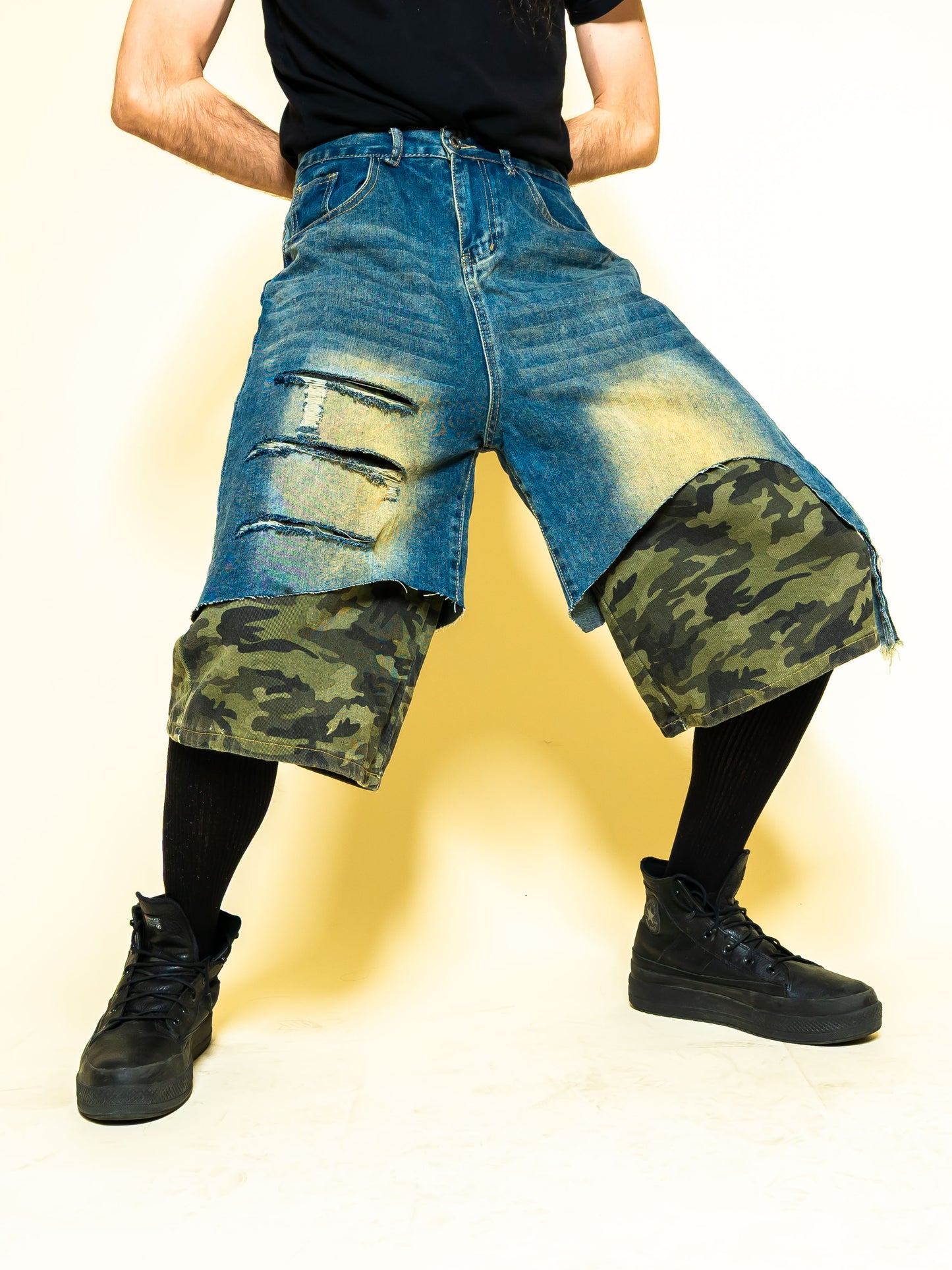 The PuNkR punk rock camo denim shorts on model | F.A.M.E. X streetwear