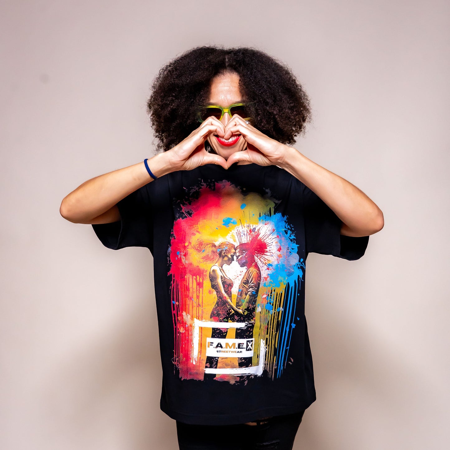 Blown Away pop art couple explosion graphic tee shirt on model | F.A.M.E. X streetwear