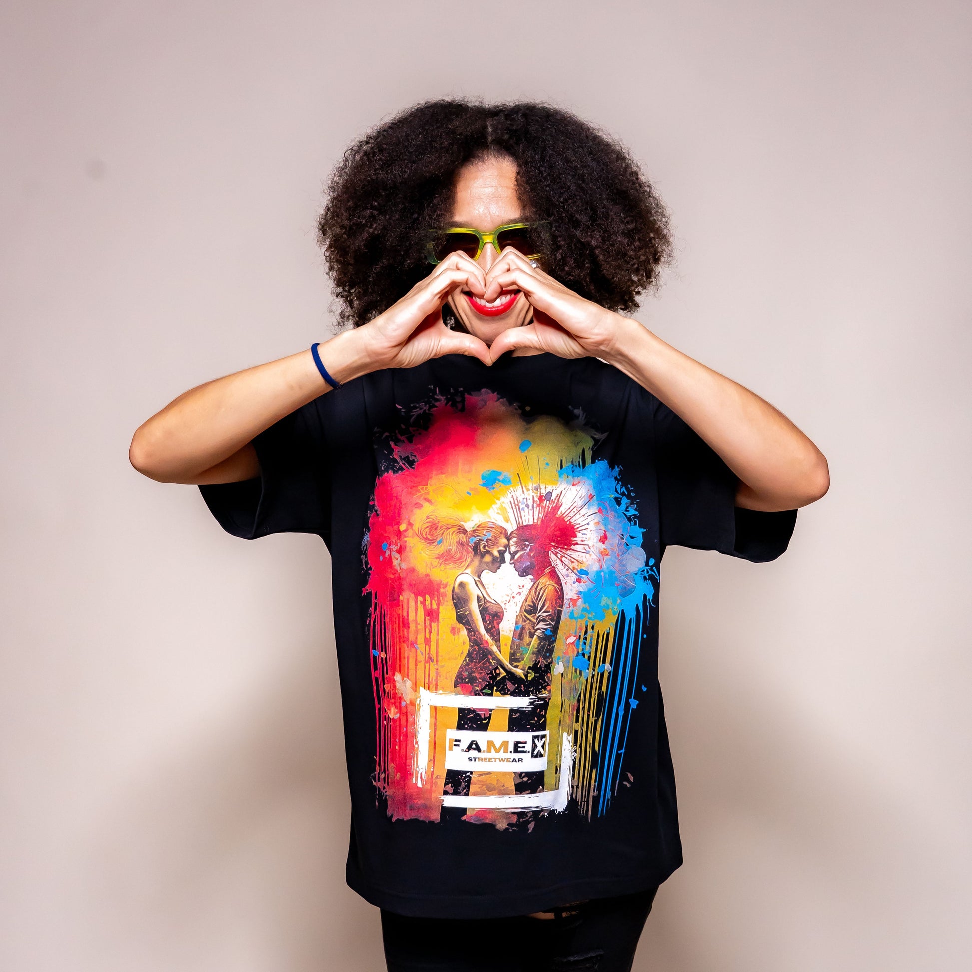 Blown Away pop art couple explosion graphic tee shirt on model | F.A.M.E. X streetwear