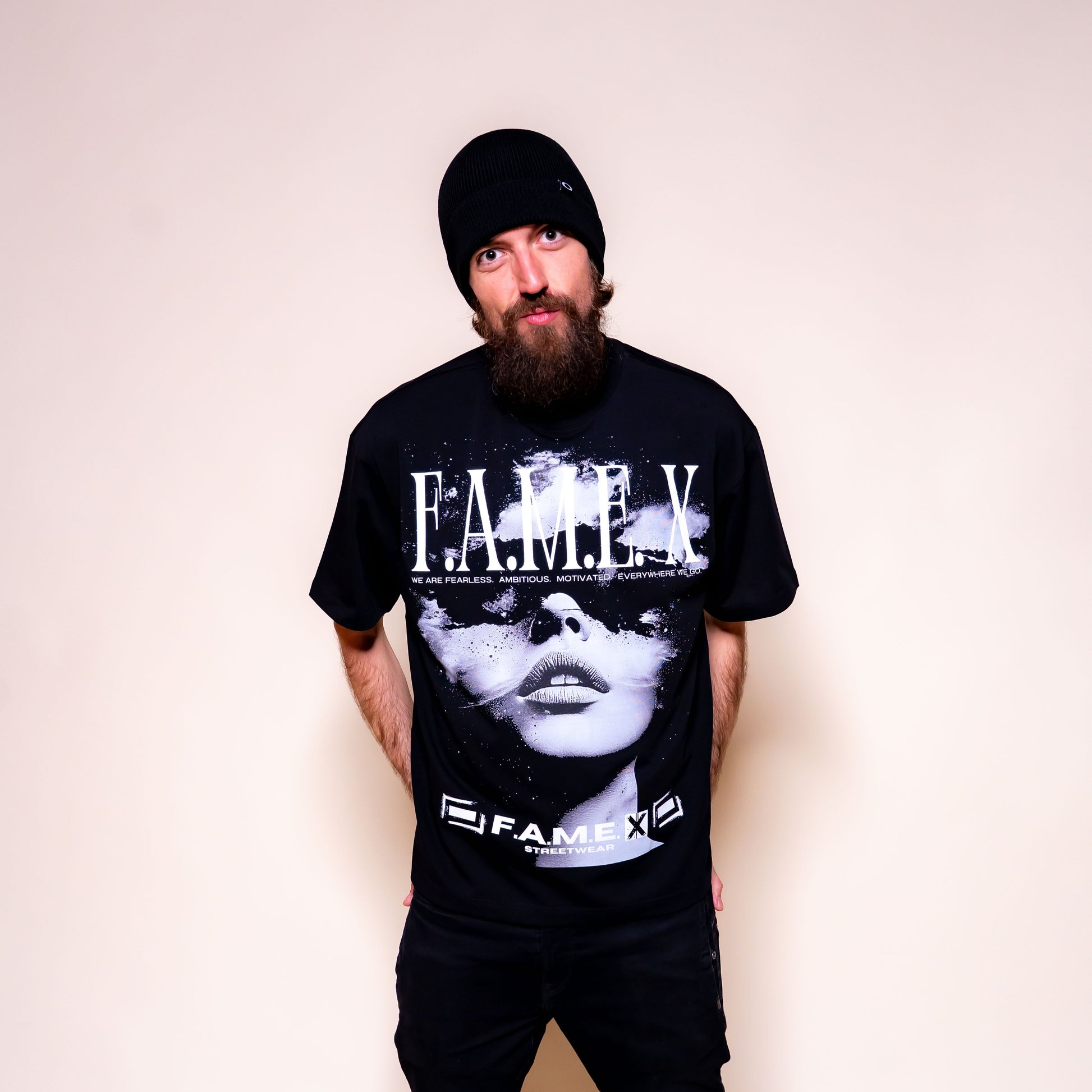 Star Gazer celestial pop art graphic tee shirt on model | F.A.M.E. X streetwear
