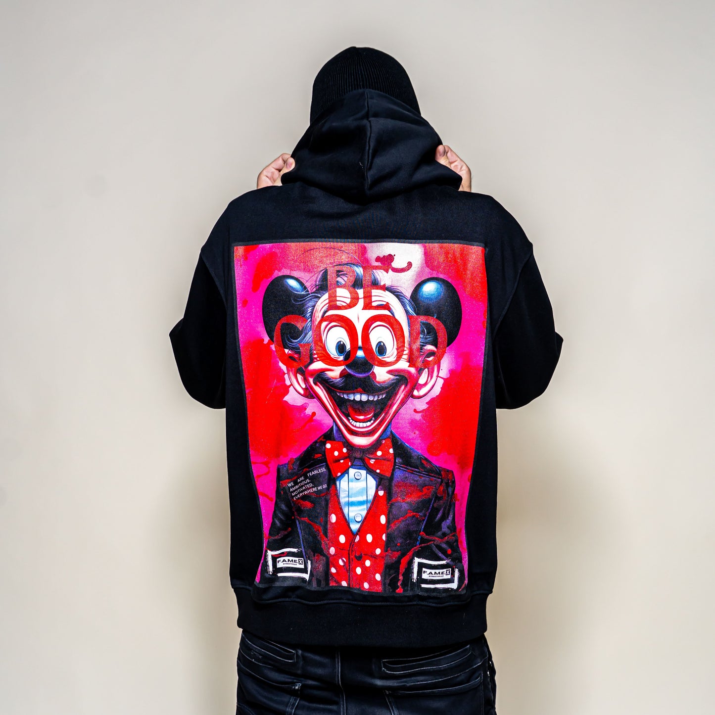 BE GOOD horror pop cartoon mascot parody art hoodie on model | F.A.M.E. X streetwear