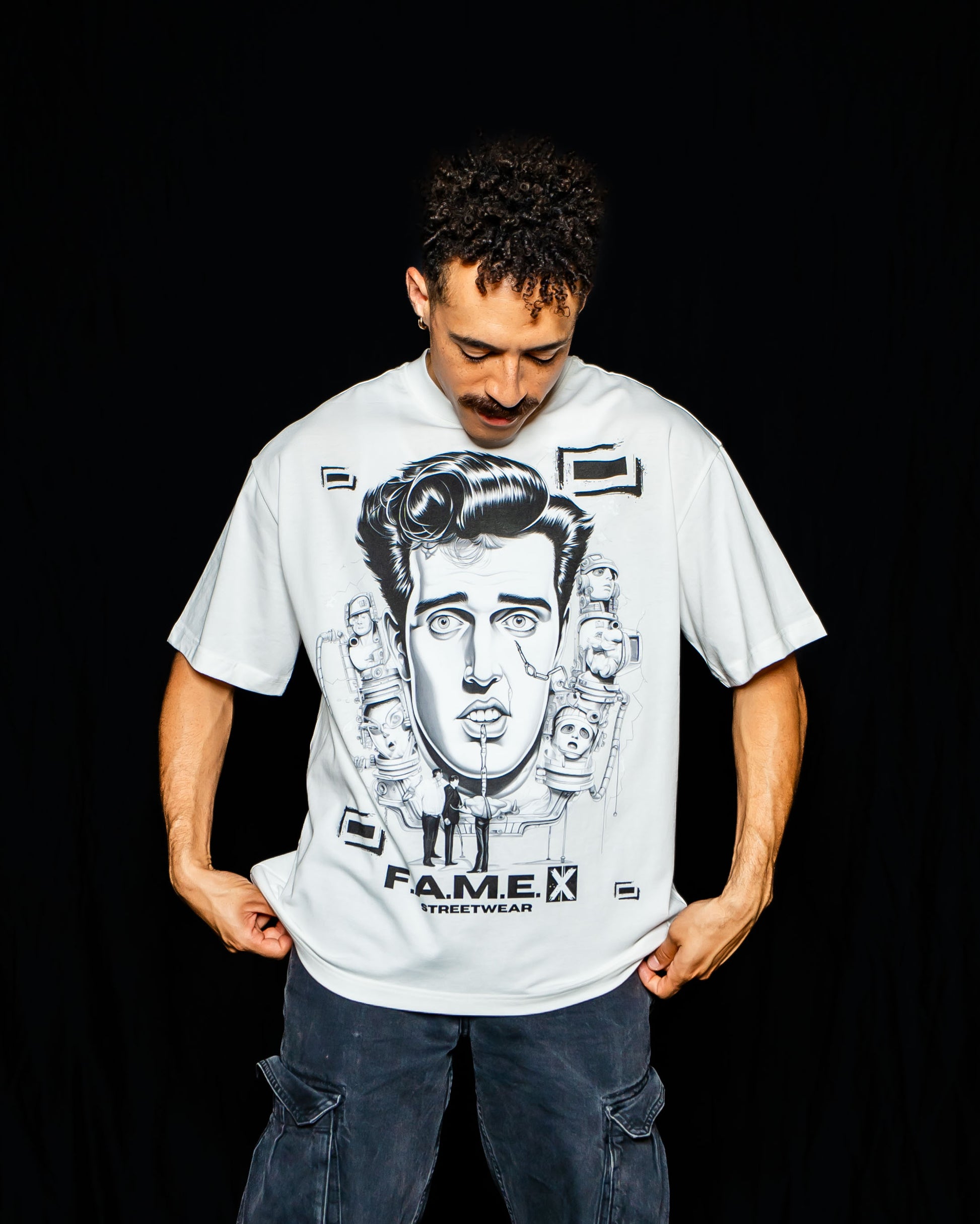 Man-Made King Elvis inspired king of rock pop art graphic tee shirt on model | F.A.M.E. X streetwear