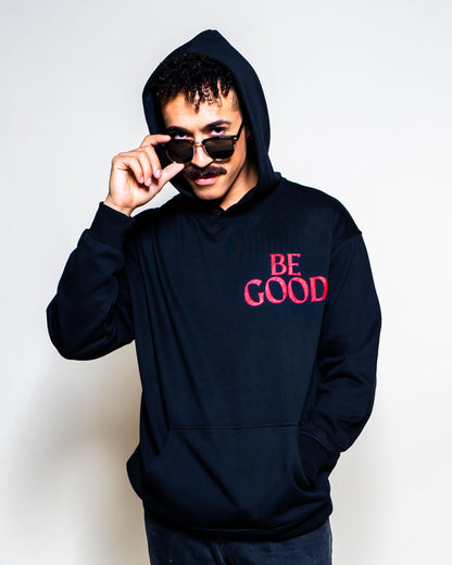 BE GOOD horror pop cartoon mascot parody art hoodie on model | F.A.M.E. X streetwear