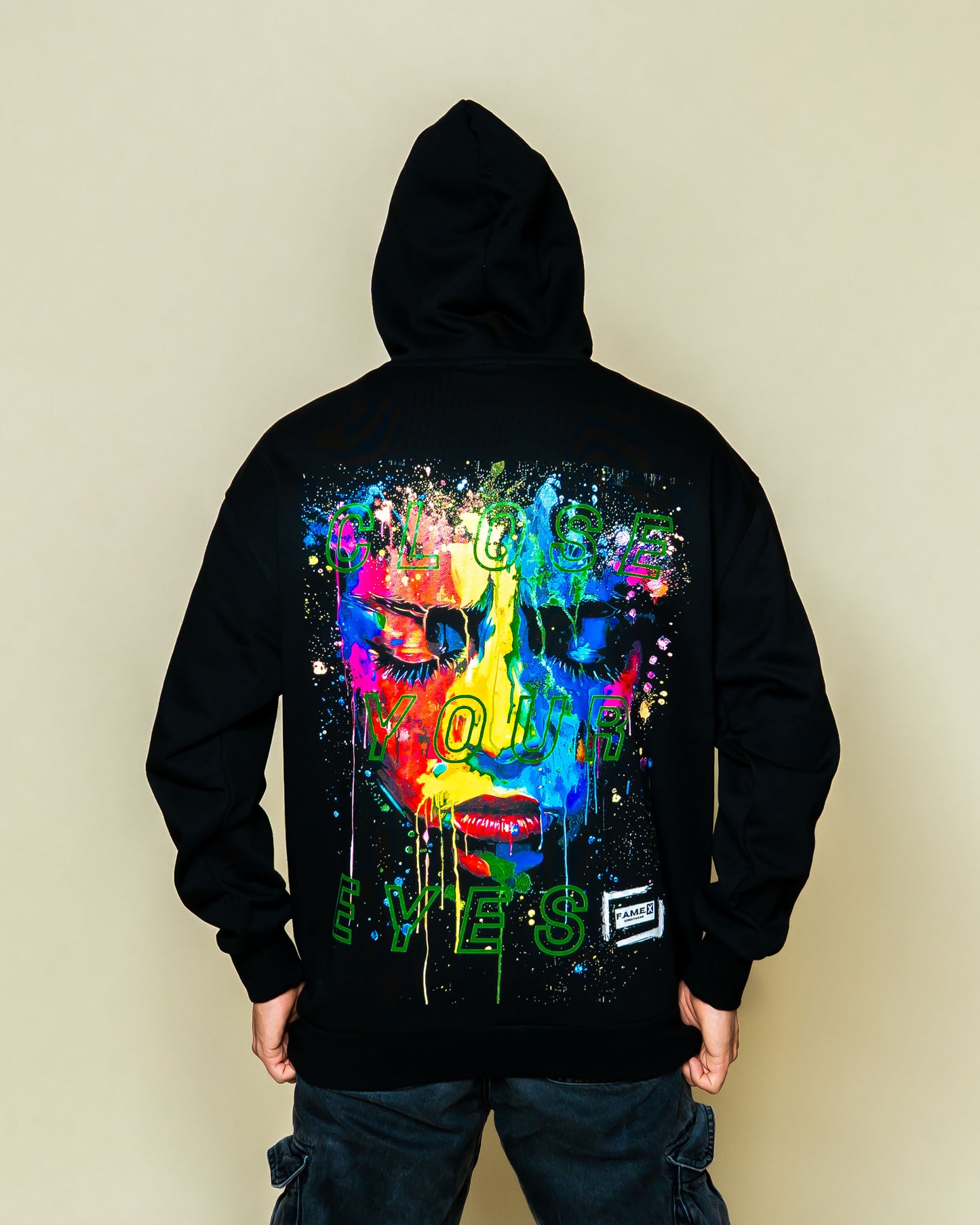 Close Your Eyes surreal pop art portrait hoodie on model | F.A.M.E. X streetwear