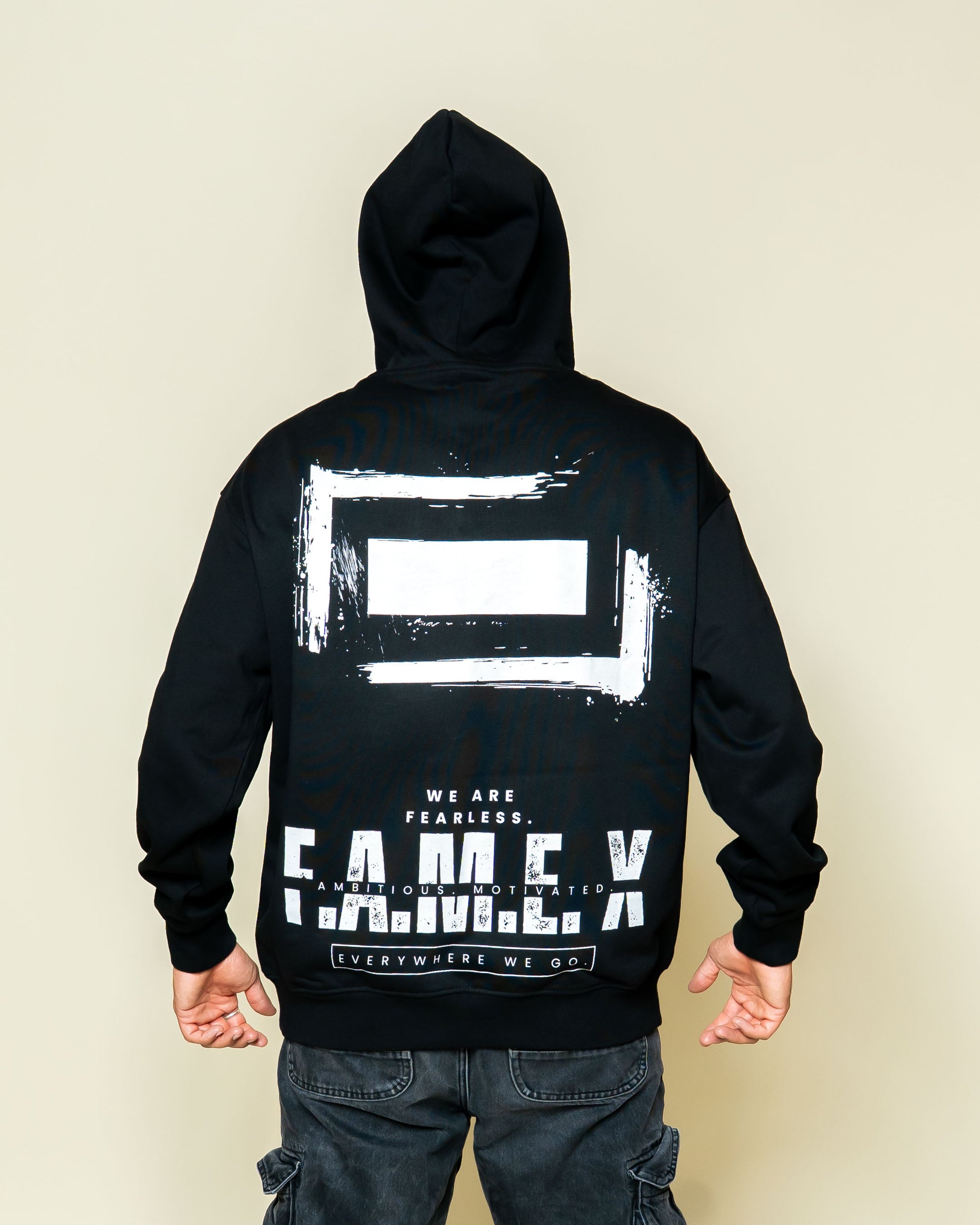 F.A.M.E. X broken frame logo hoodie on model | F.A.M.E. X streetwear