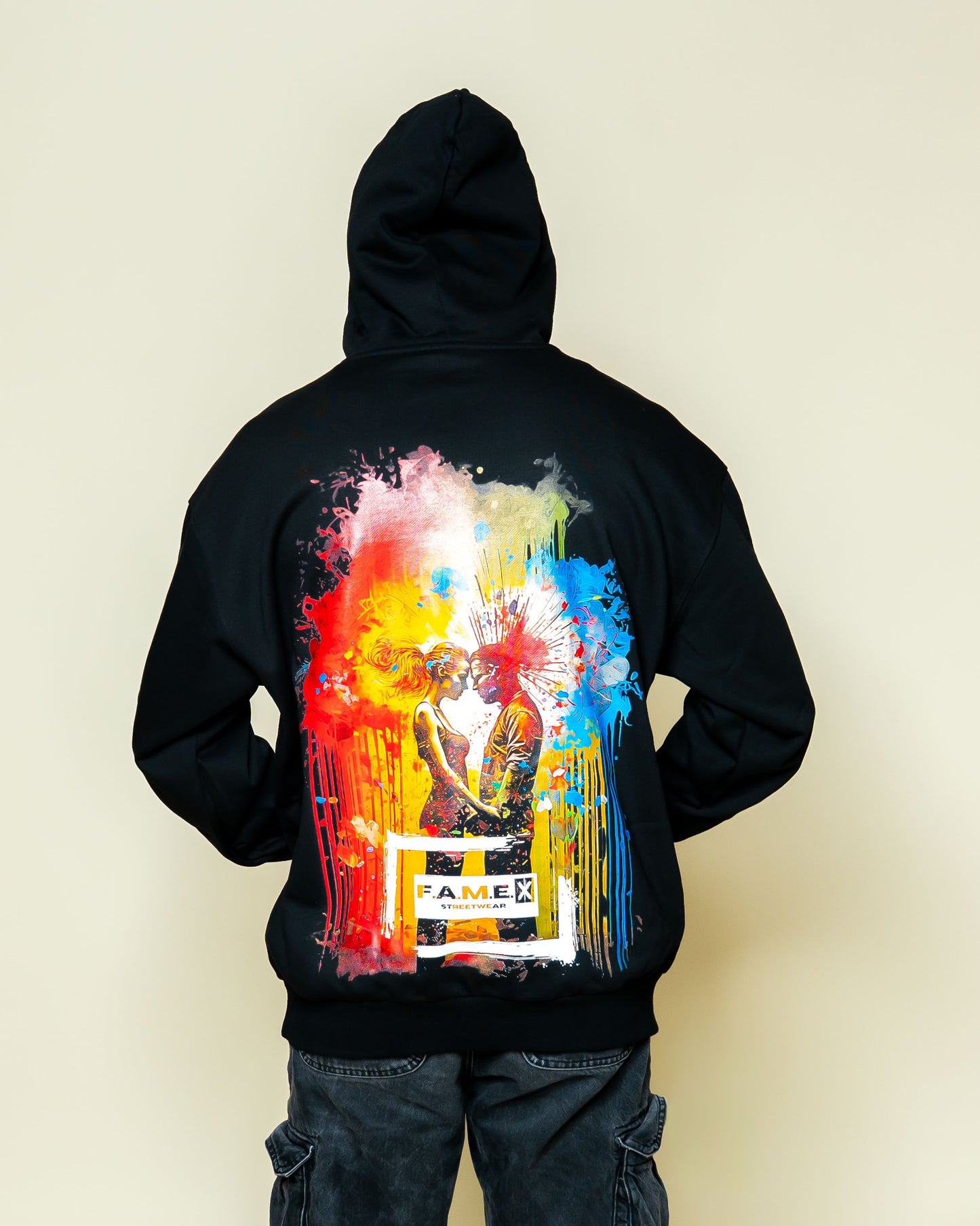 Blown Away pop art couple explosion hoodie on model | F.A.M.E. X streetwear